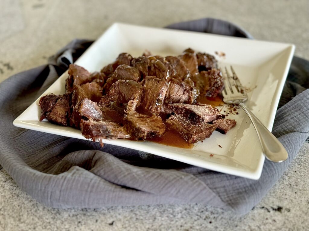 sliced roast beef on plate